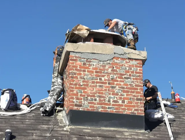 La Mirada Chimney Sweep installing a custom chimney crown in La Mirada, CA